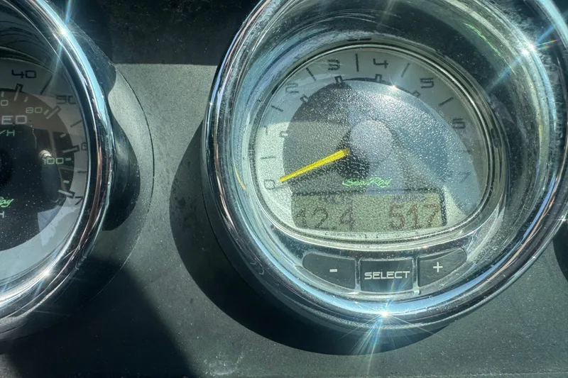 Slide: The Image of Close-up of 2011 Sea Ray 270 SLX dashboard gauges in sunlight. - 17