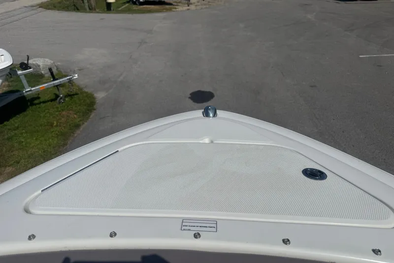 Slide: The Image of Bow view of a 2011 Sea Ray 270 SLX boat on a trailer. - 21
