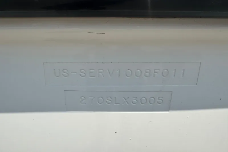 Slide: The Image of 2011 Sea Ray 270 SLX hull identification number engraved on the boat. - 25