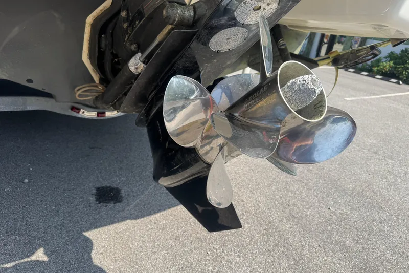 Slide: The Image of Close-up of a 2011 Sea Ray 270 SLX boat propeller on pavement. - 3