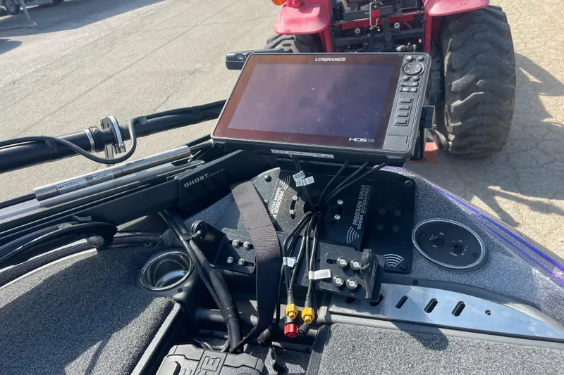 Slide: The Image of 2023 Triton 19TRX Patriot boat dashboard with Lowrance HDS display and Ghost trolling motor. - 10