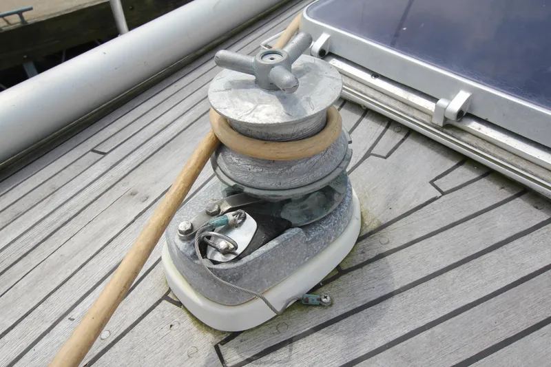 Slide: The Image of Winch on 1982 Nautor Swan 371 sailboat deck, showcasing nautical equipment details. - 12