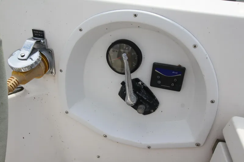 Slide: The Image of Control panel of a 1982 Nautor Swan 371 yacht, featuring gauges and switches. - 13