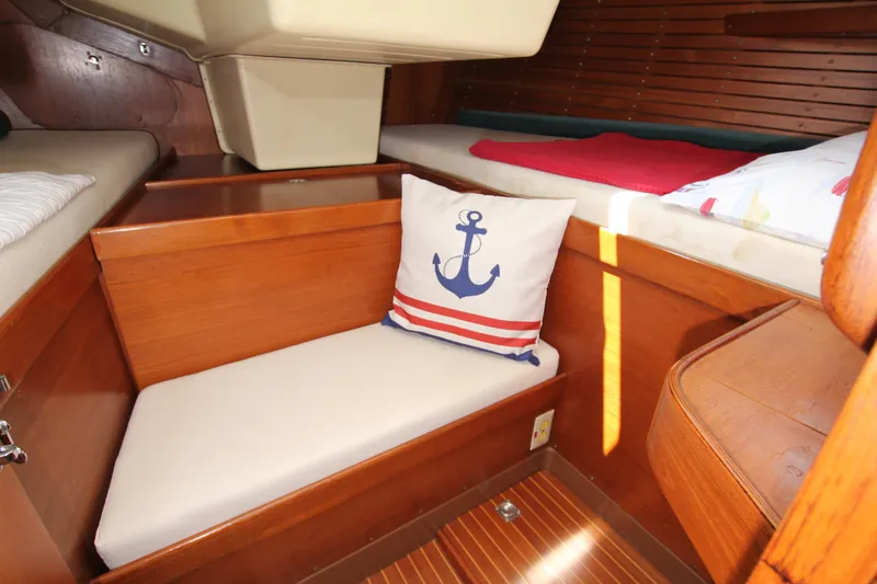 Slide: The Image of Cozy cabin interior of 1982 Nautor Swan 371 sailboat with nautical-themed decor. - 29