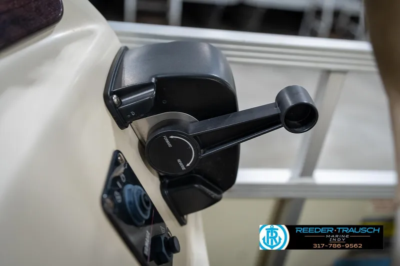 Slide: The Image of Close-up of a 2004 Bennington 185L boat throttle control lever. - 32