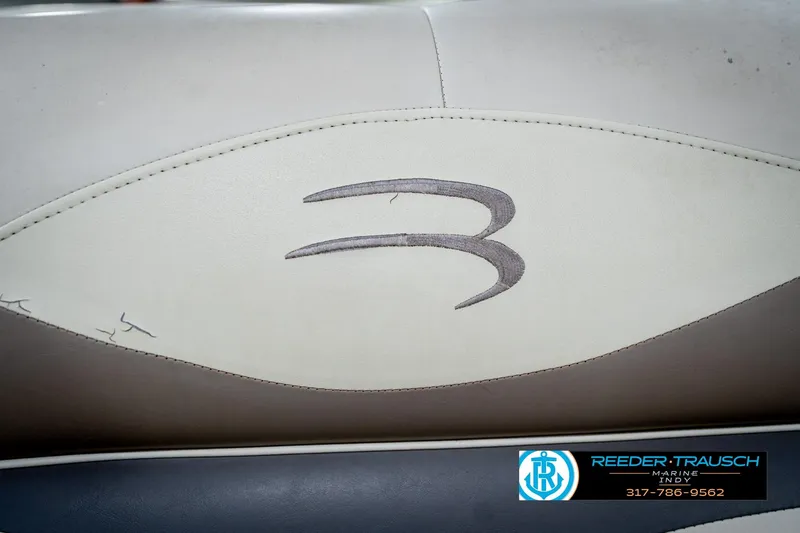 Slide: The Image of 2004 Bennington 185L boat seat with logo, featuring Reeder Trausch Marine contact details. - 37