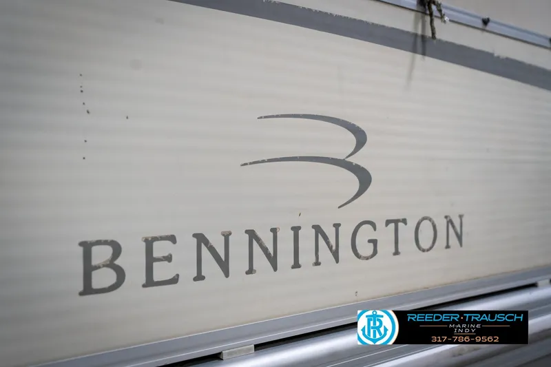 Slide: The Image of 2004 Bennington 185L boat logo with Reeder Trausch Marine contact details. - 39