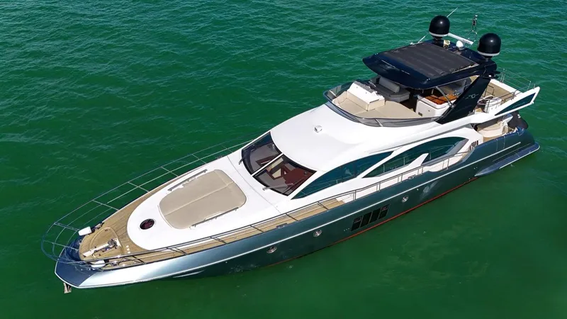 Slide: The Image of Azimut Flybridge 2012 yacht on clear green water, aerial view. - 17