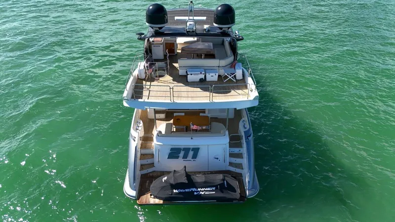 Slide: The Image of Azimut Flybridge 2012 yacht on green water, rear view. - 19