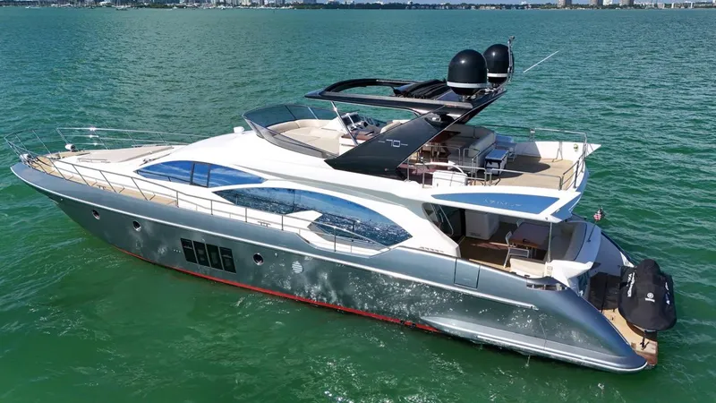 Slide: The Image of Azimut Flybridge 2012 yacht cruising on calm green waters. - 23