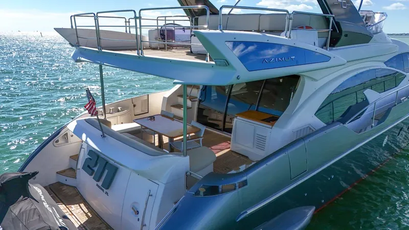 Slide: The Image of Azimut Flybridge 2012 yacht on open water, featuring spacious deck and modern design. - 29