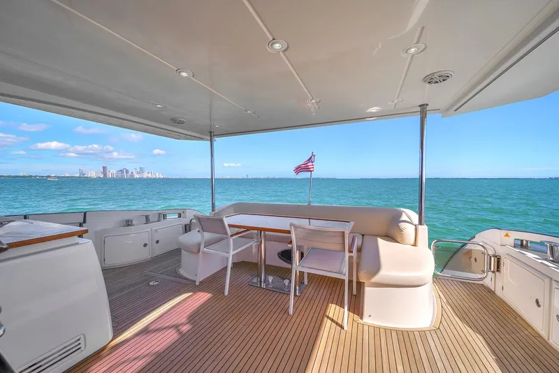Slide: The Image of Luxurious 2012 Azimut Flybridge yacht deck with ocean view and city skyline. - 32