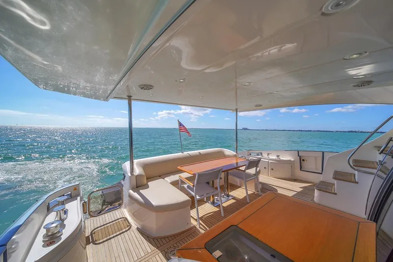 Slide: The Image of Azimut Flybridge 2012 yacht deck with ocean view and seating area. - 35
