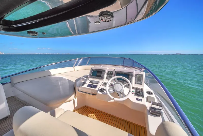 Slide: The Image of Azimut Flybridge 2012 yacht helm with ocean view and modern controls. - 40