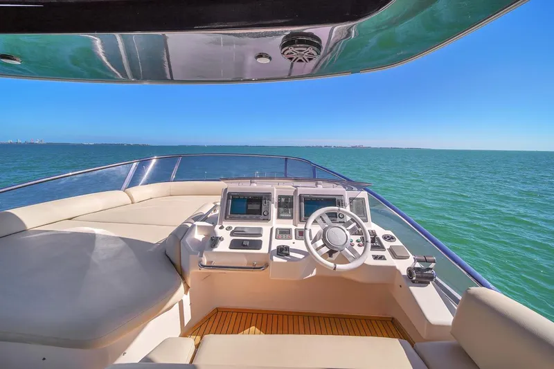 Slide: The Image of Azimut Flybridge 2012 yacht helm with ocean view and clear blue sky. - 41