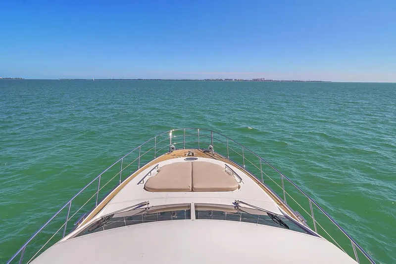Slide: The Image of Azimut Flybridge 2012 yacht cruising on open sea under clear blue sky. - 42