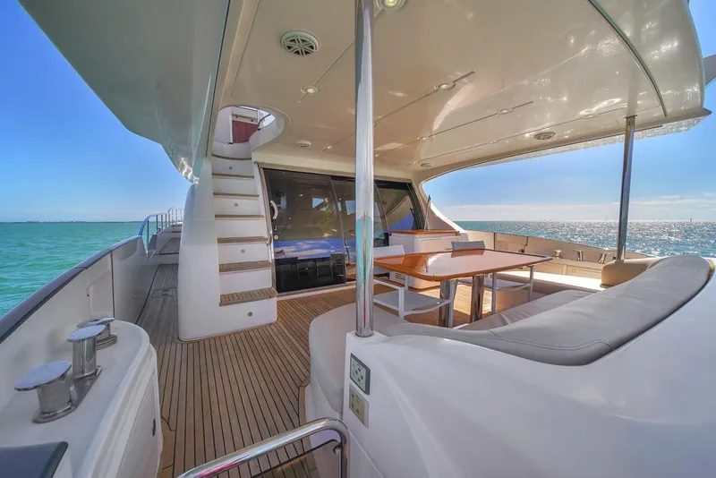 Slide: The Image of Luxurious 2012 Azimut Flybridge yacht with spacious deck and ocean view. - 46