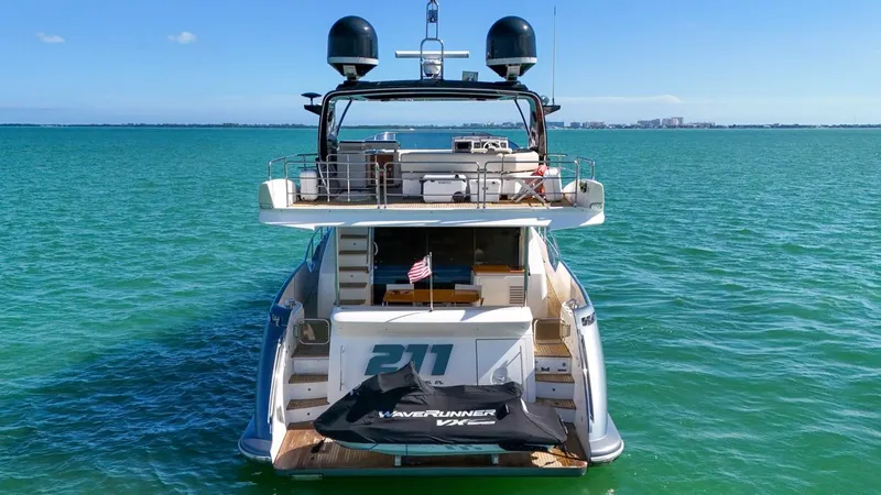 Slide: The Image of Azimut Flybridge 2012 yacht on turquoise water with jet ski on deck. - 6