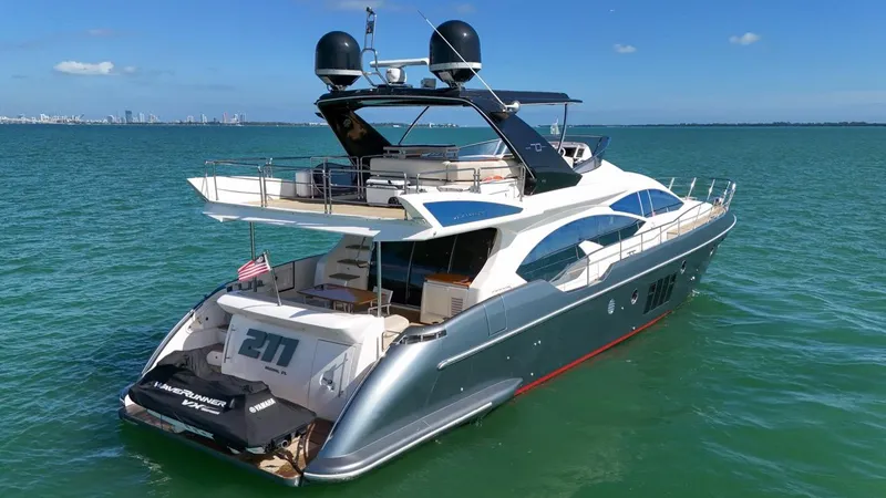 Slide: The Image of 2012 Azimut Flybridge yacht cruising on open water. - 7