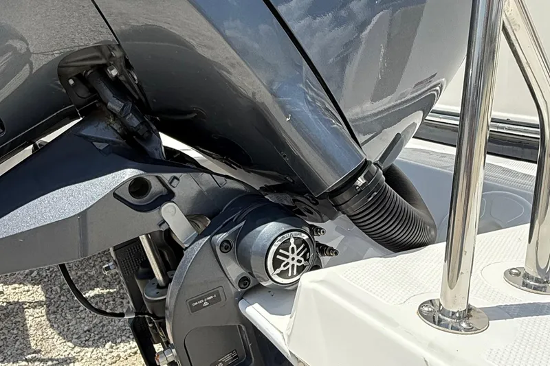 Slide: The Image of Close-up of 2025 Ranger Tugs R-23 boat engine and railing detail. - 8