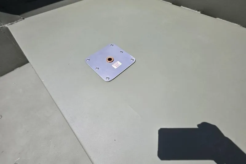 Slide: The Image of 2026 Weldcraft 1648 UV/DD ECONO Bass boat deck with metal fixture. - 20