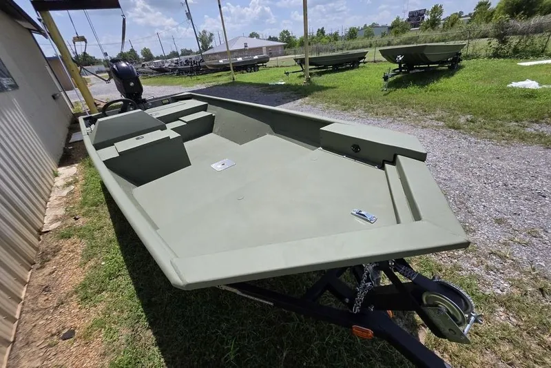 Slide: The Image of 2026 Weldcraft 1648 UV/DD ECONO Bass boat on trailer, parked outdoors. - 23