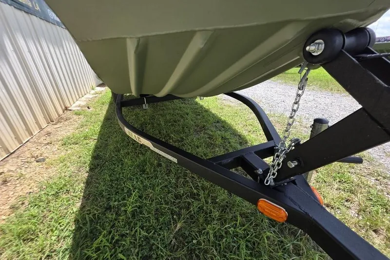 Slide: The Image of 2026 Weldcraft 1648 UV/DD ECONO Bass boat on trailer, grassy area. - 26