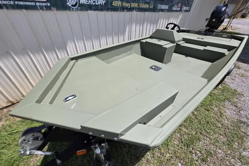 Slide: The Image of 2026 Weldcraft 1648 UV/DD ECONO Bass boat, olive green, parked outdoors. - 27