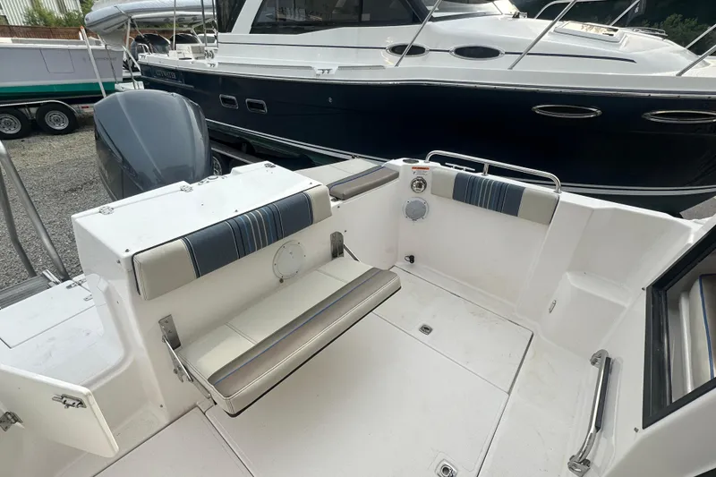 Slide: The Image of 2017 Cutwater C24 boat interior with cushioned seating and modern design. - 3