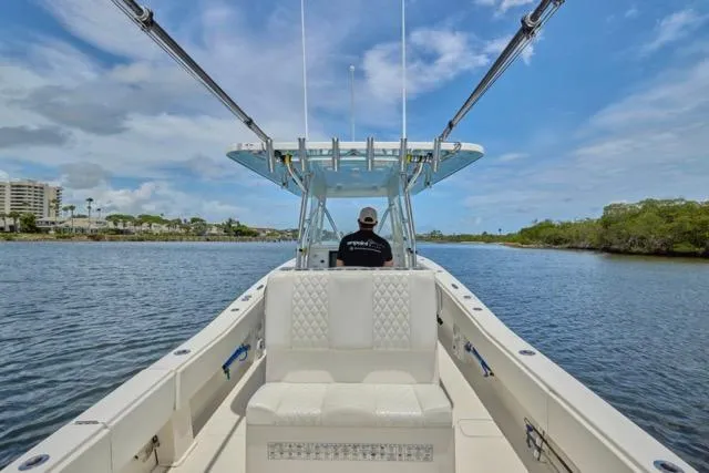 Slide: The Image of Invincible 36 boat interior, 2015 model, cruising on a sunny day with clear skies. - 19