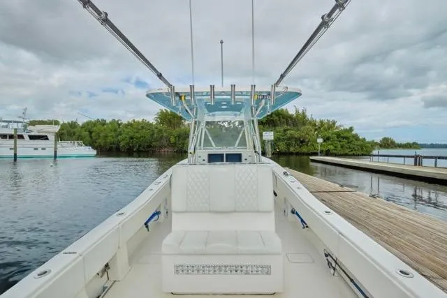 Slide: The Image of 2015 Invincible 36 boat interior with modern helm and seating. - 6