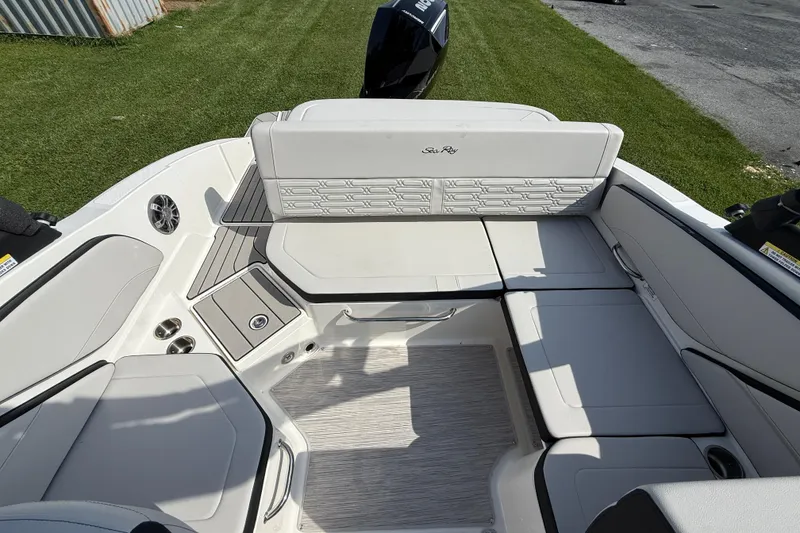 Slide: The Image of 2025 Sea Ray SPX 210 Outboard boat interior with spacious seating and modern design. - 5