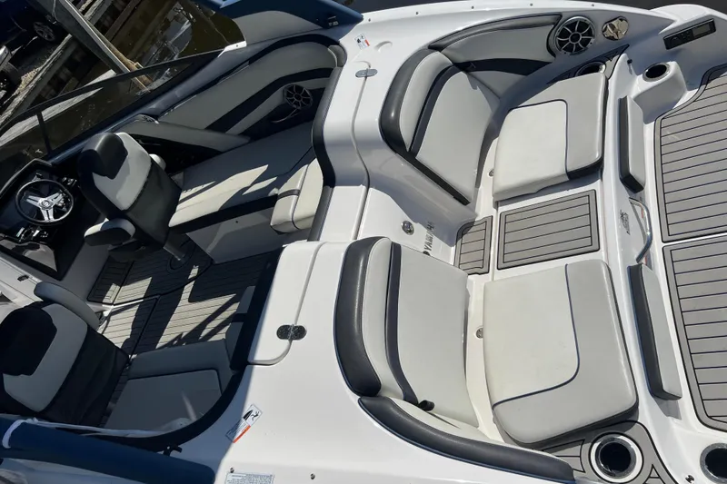 Slide: The Image of 2020 Yamaha Boats 242SE interior with sleek seating and modern design. - 3