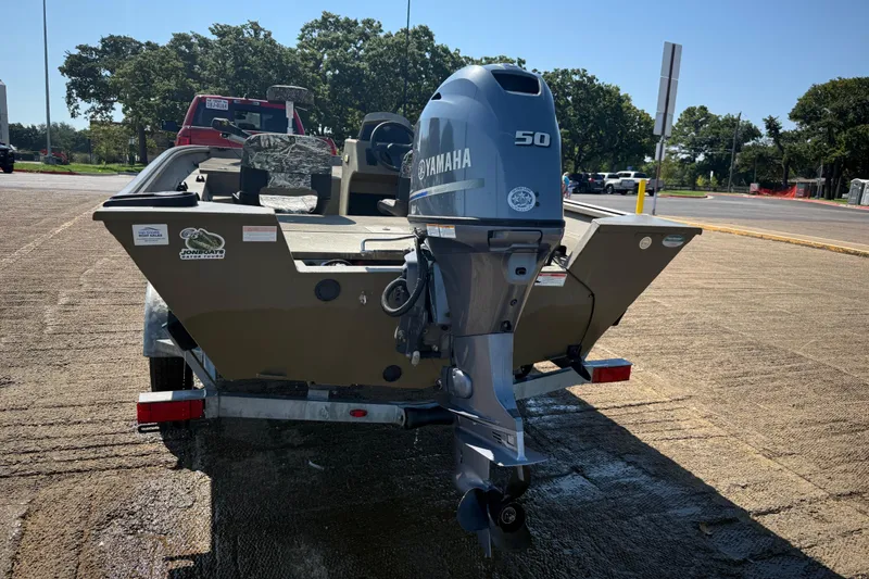 Slide: The Image of 2020 G3 Gator Tough 17 SC boat with 50 HP motor on trailer. - 10