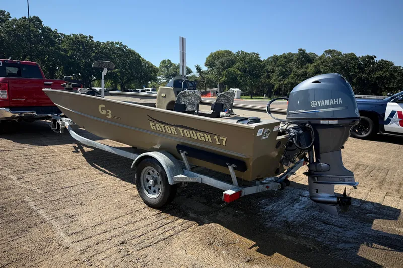 Slide: The Image of 2020 G3 Gator Tough 17 SC boat with Yamaha motor on trailer. - 12