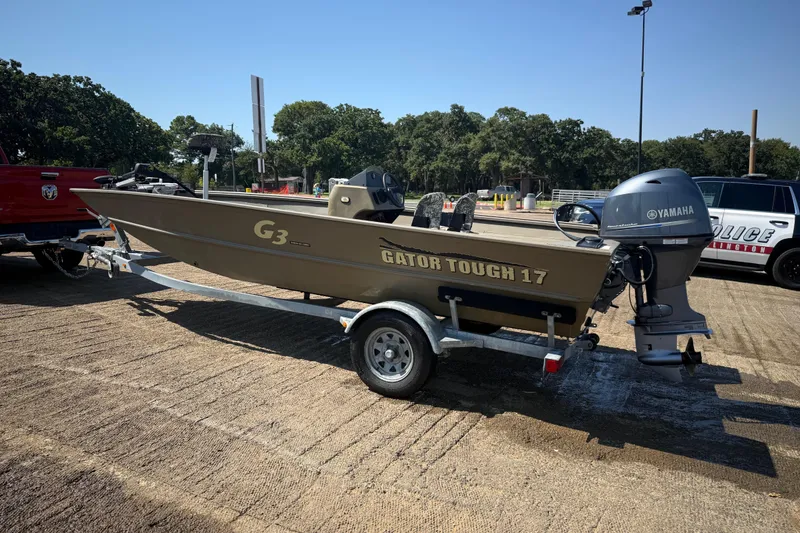 Slide: The Image of 2020 G3 Gator Tough 17 SC boat with Yamaha motor on trailer. - 13