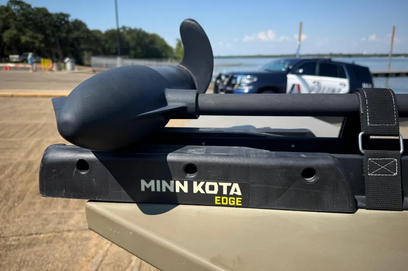 Slide: The Image of 2020 G3 Gator Tough 17 SC boat with trolling motor at a boat ramp. - 21