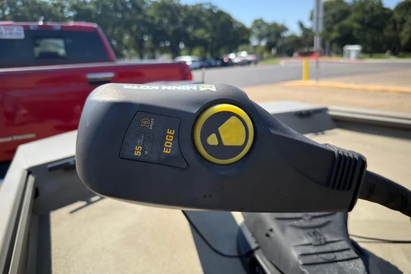 Slide: The Image of 2020 G3 Gator Tough 17 SC boat at lakeside with camo seats and motor. - 23