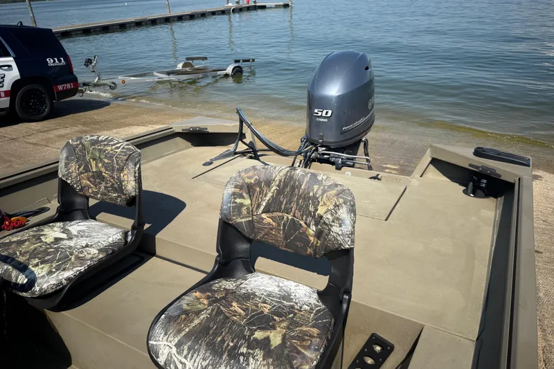 Slide: The Image of 2020 G3 Gator Tough 17 SC boat dashboard with steering wheel and Humminbird fish finder. - 26