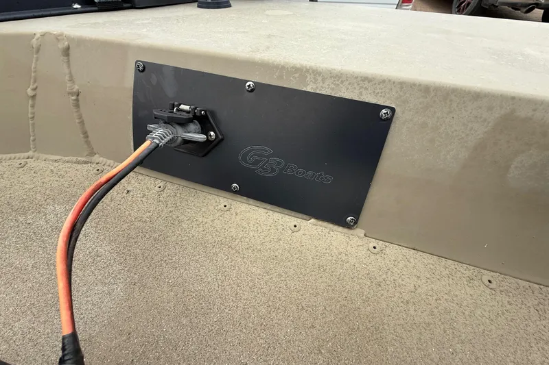 Slide: The Image of Open storage compartment in 2020 G3 Gator Tough 17 SC boat, showing interior details. - 33