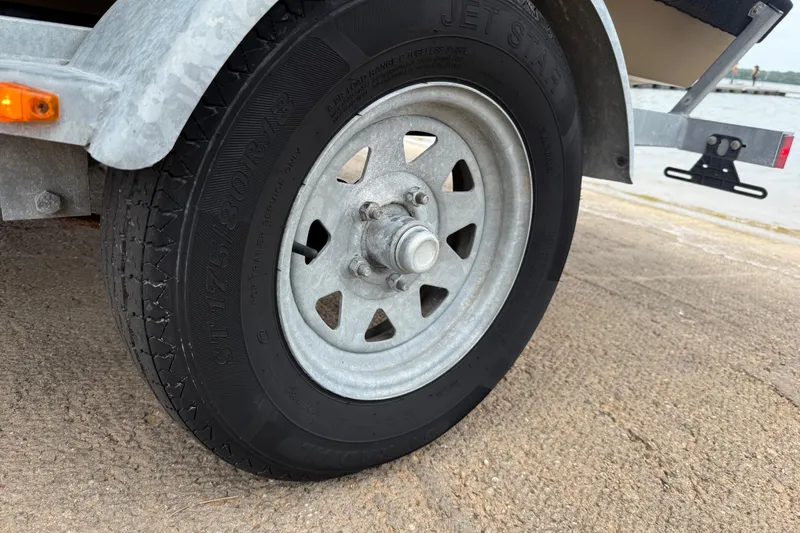 Slide: The Image of Trailer wheel of 2020 G3 Gator Tough 17 SC on concrete surface. - 46