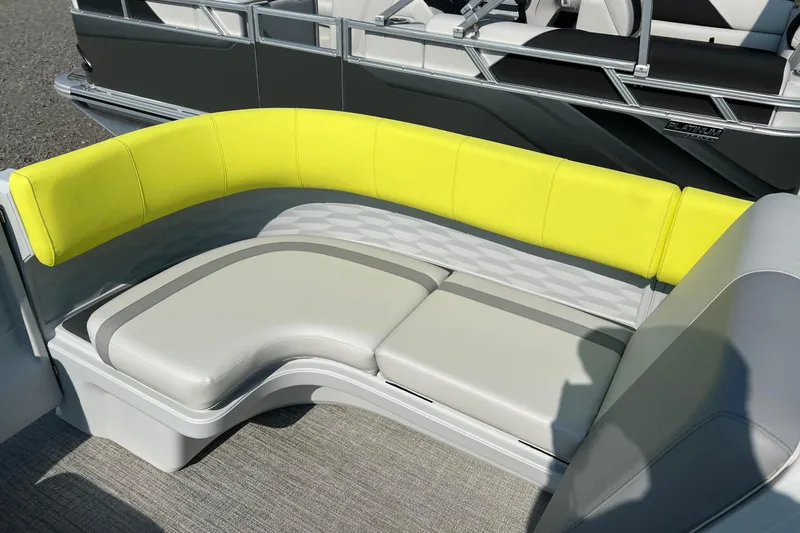 Slide: The Image of 2026 Tahoe Pontoon AURA 1985 with vibrant yellow and gray seating. - 13