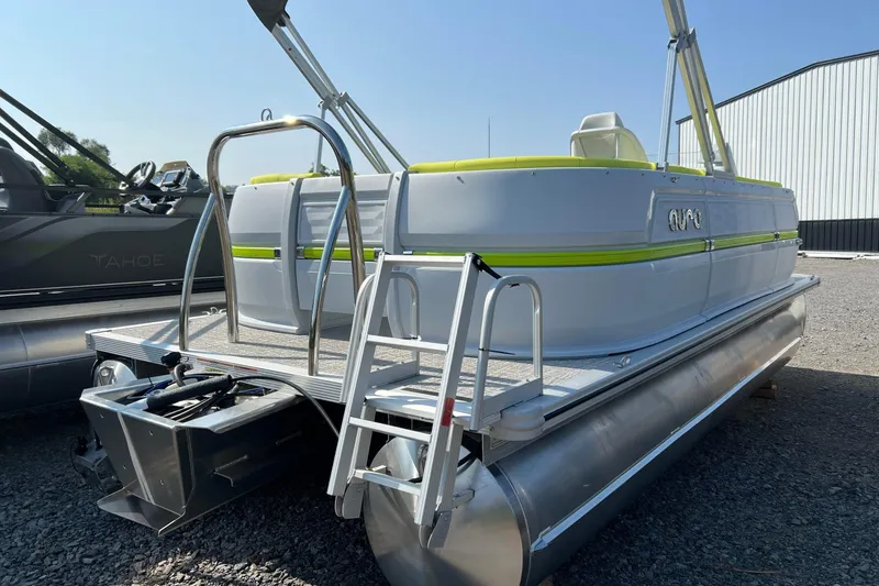 Slide: The Image of 2026 Tahoe Pontoon AURA 1985 boat with sleek design and vibrant accents. - 6