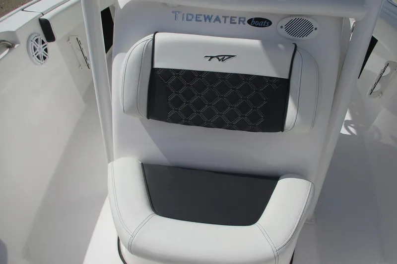 Slide: The Image of 2023 Tidewater 210 LXF boat seat with black and white upholstery design. - 21
