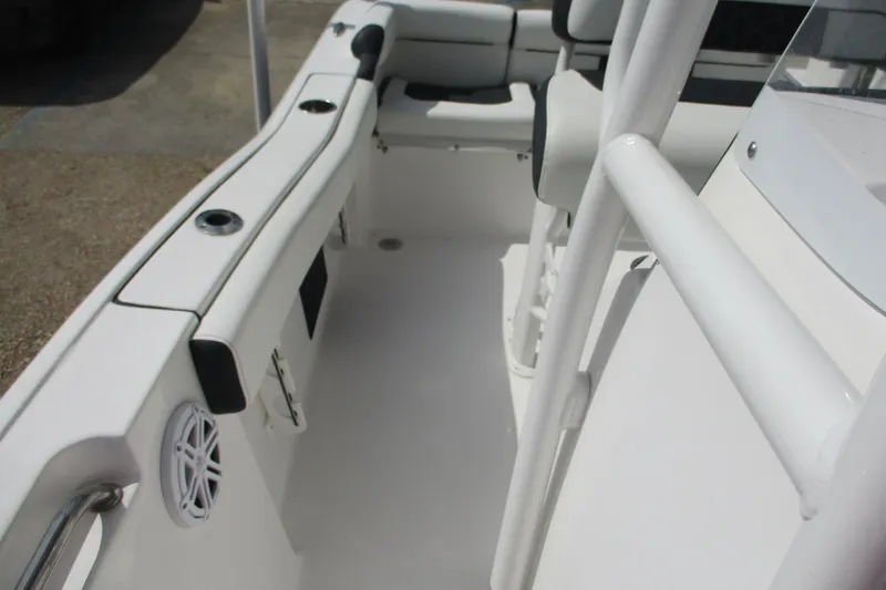 Slide: The Image of 2023 Tidewater 210 LXF boat interior with seating and rod holders. - 25