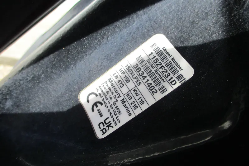 Slide: The Image of Sticker on 2023 Tidewater 210 LXF boat displaying model and serial numbers. - 30