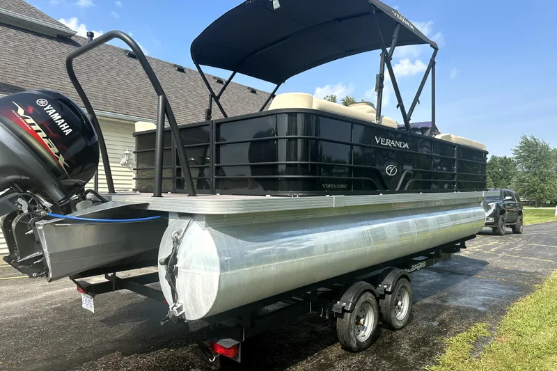 Slide: The Image of 2021 Veranda Vista 22RC pontoon boat with Yamaha engine on trailer. - 11