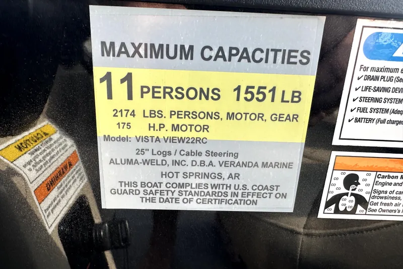 Slide: The Image of 2021 Veranda Vista 22RC capacity label, 11 persons, 1551 lbs, 175 HP motor. - 20