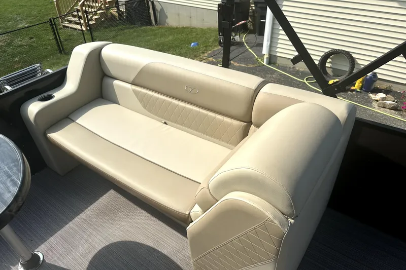 Slide: The Image of Beige seating on 2021 Veranda Vista 22RC boat, outdoor setting. - 21