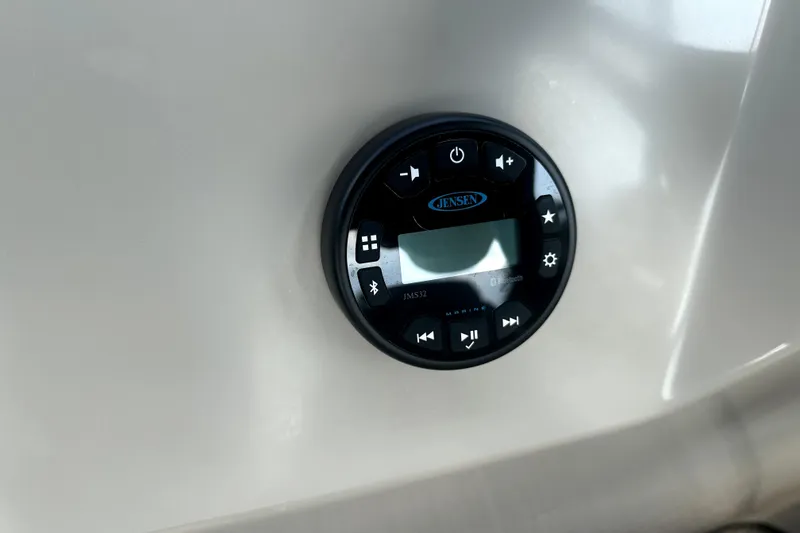 Slide: The Image of Jensen marine audio system on 2021 Veranda Vista 22RC boat dashboard. - 27